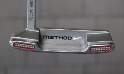 tony-romo-tiger-woods-putter